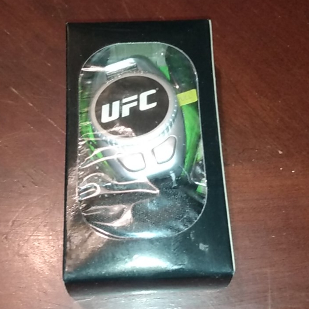 NWT UFC Listen Live & FM Radio with Earbuds